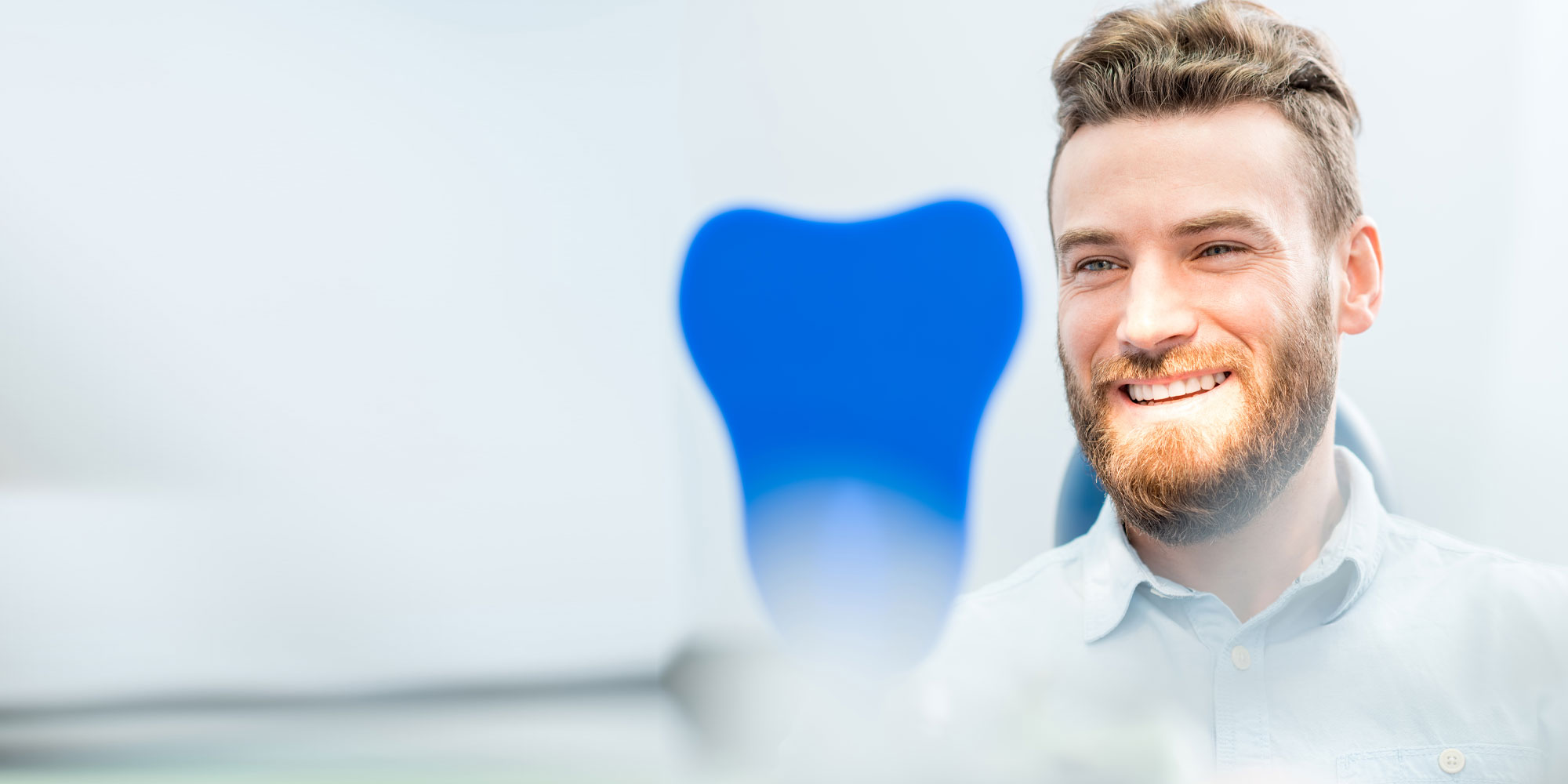 dental patient smiling after gum recession treatment