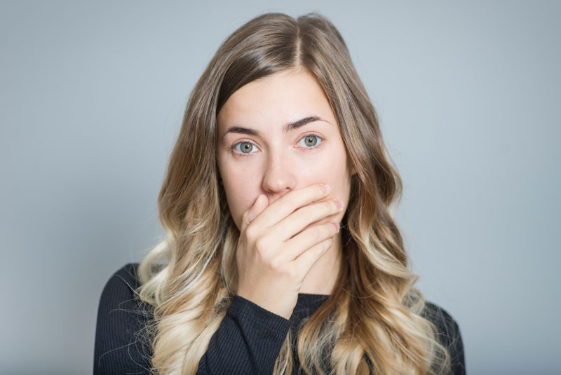 Dental Patient Hiding Her Smile