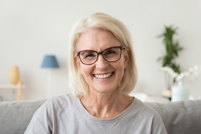 Dental Patient Smiling After Getting Dental Implants In Danbury, CT