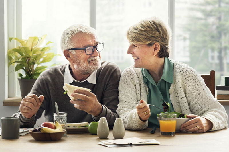 Dental Implant Patients Eating Together In Danbury, CT